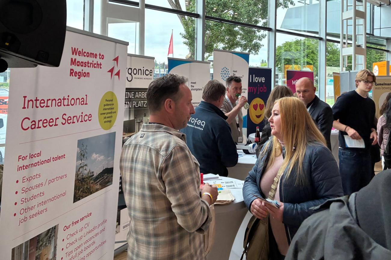 People talking at international career event